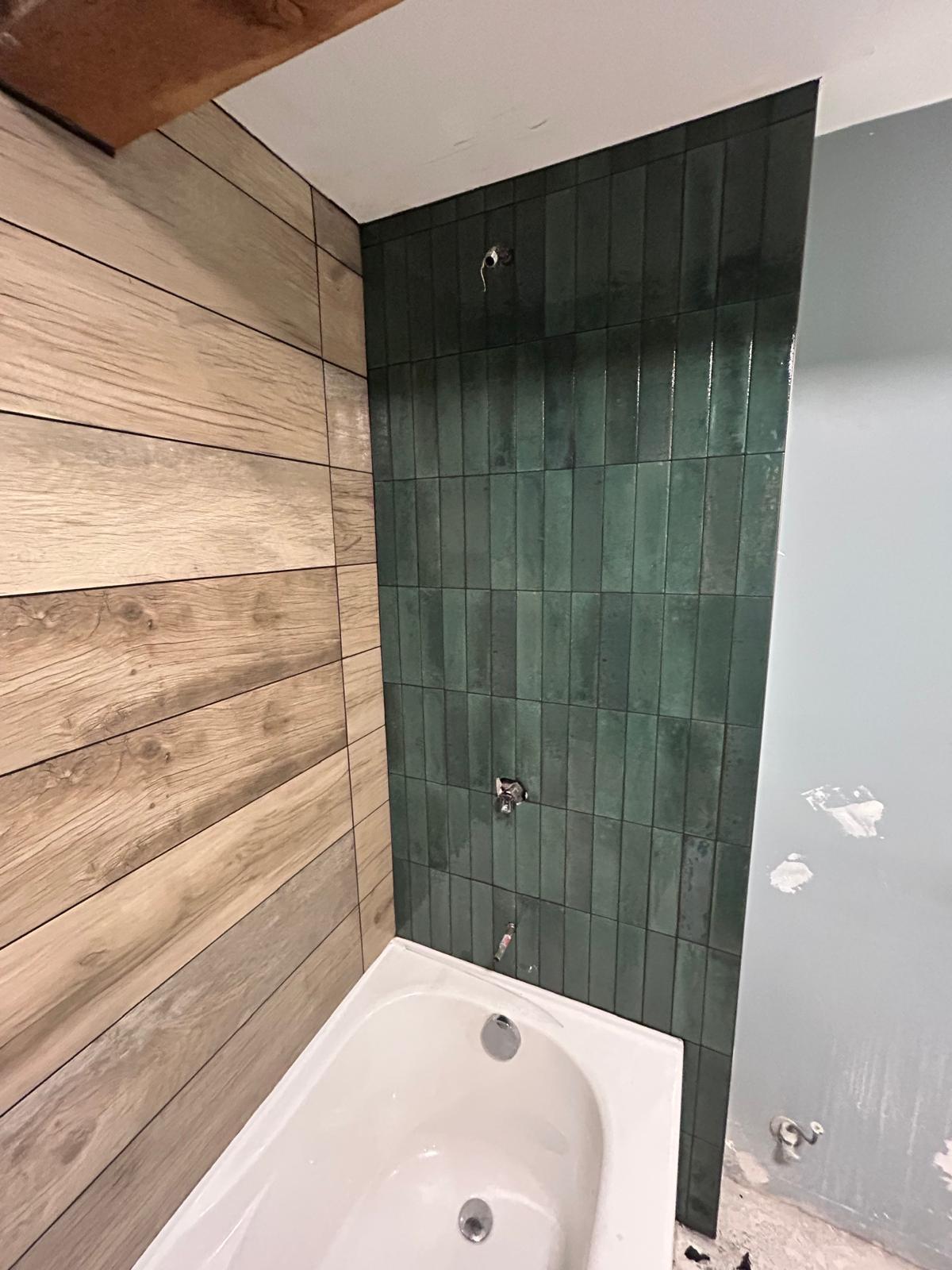 Wood look tub shower green accent