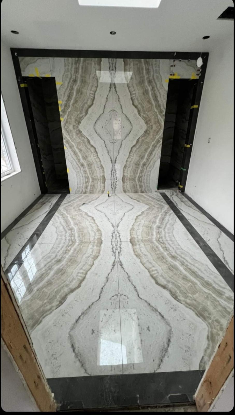 Grand foyer bookmatched marble
